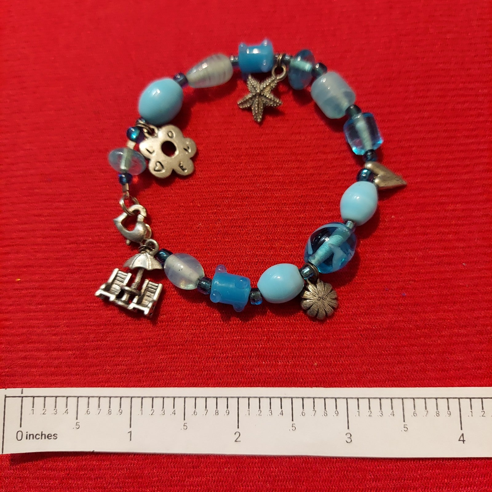 Vintage "Love Of The Beach" Theme Silver Tone Charms And Blue Beads 7" Bracelet